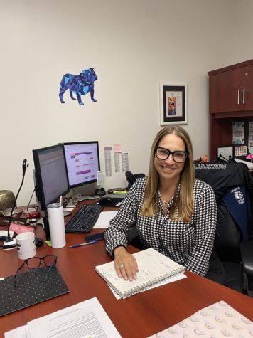 Ms. Lanz, Dean of Student Affairs, works in her office