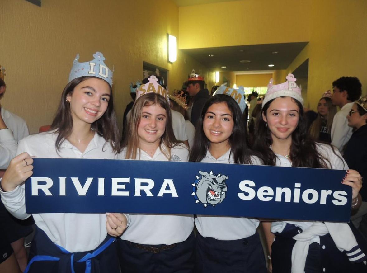 Isabella Dorer, Samantha Drumgoogle, Emily Jimenez-Kalinowski, and Penelope Cartaya wearing their senior crowns on the first day of school.