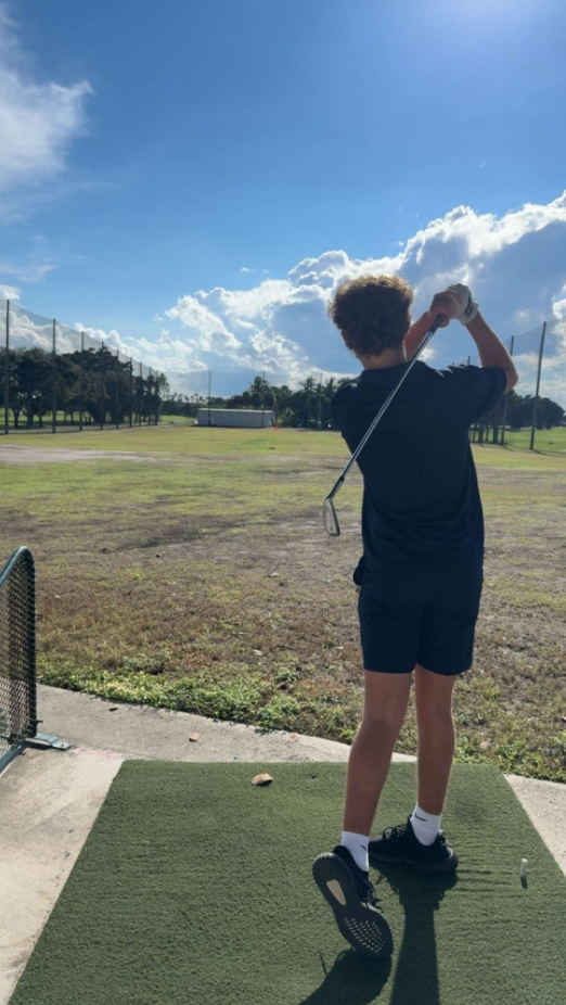 Francisco Collado warms up at the range at Palmetto Bay Golf Course.