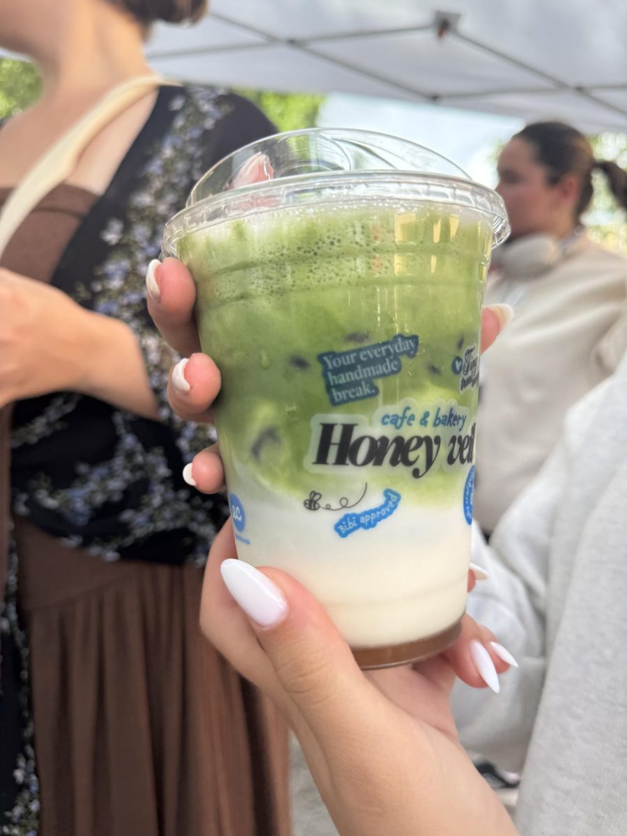  Honey Veil’s signature Iced Vanilla matcha made with a honey whipped topping. 
