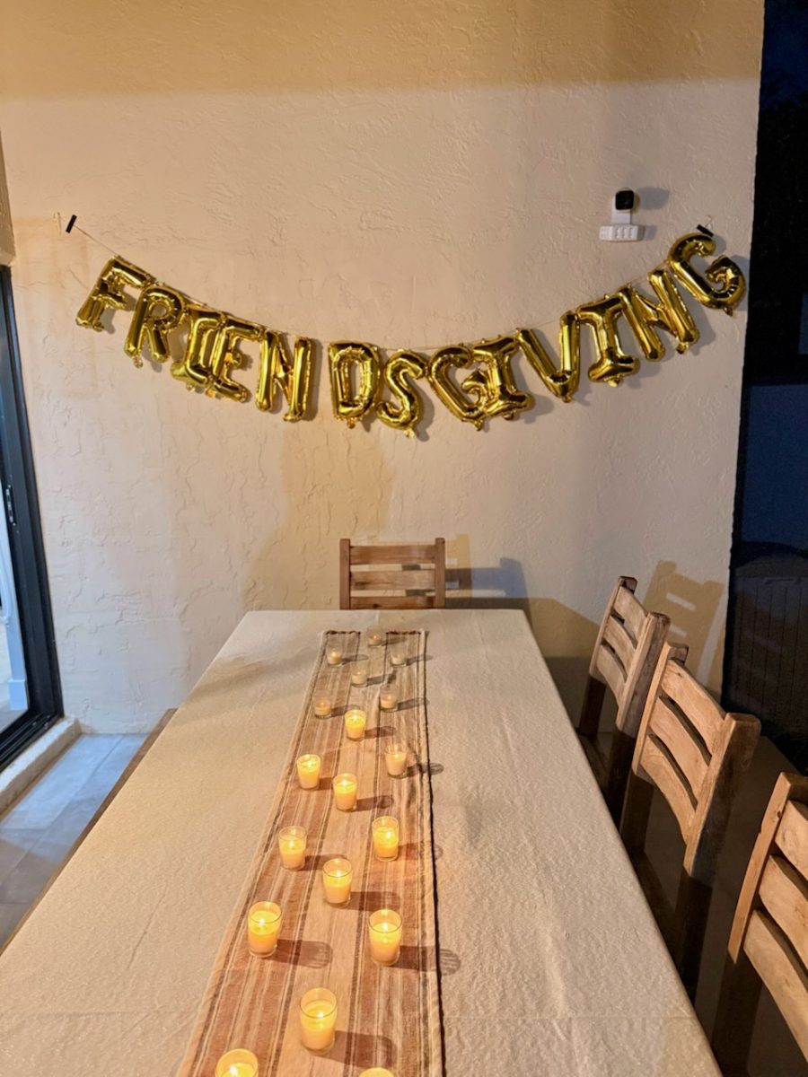 A Friendsgiving table setup awaits friend's arrival. The event brought friends together to share food and celebrate before Thanksgiving break.
