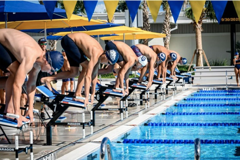The varsity swimmers are about to dive into the pool and compete against Columbus. This marks an important moment in Riviera history, after many years of training and practice to get the swim team to nationals. 