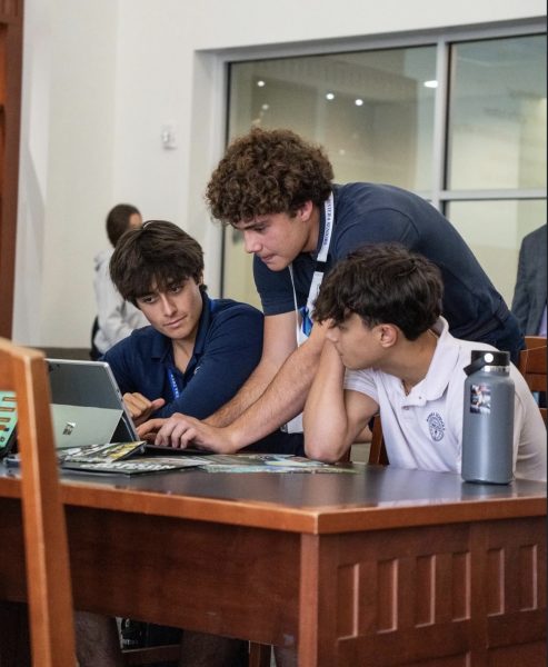 Students collaborate on financial concepts, highlighting the growing need for real-world money management skills in education.